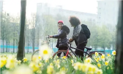  ?? ?? Two wheels or four – or both? One in five drivers is also a regular cyclist. Photograph: Caia Image/Getty Images/Posed by models