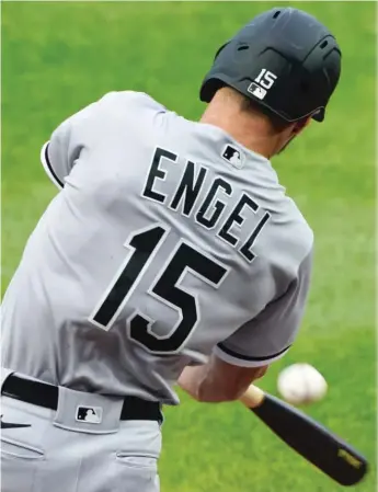  ?? CHARLIE RIEDEL/AP ?? Sox right fielder Adam Engel connects for a three-run home run in the second inning Friday.