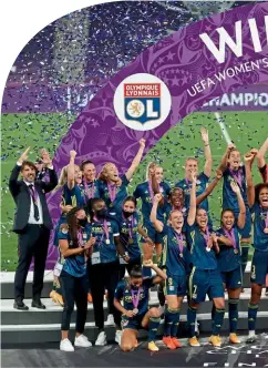  ??  ?? Winners…Lyon lift the trophy for the seventh time