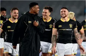  ?? GETTY IMAGES ?? TJ Perenara, eight, enjoys the winning feeling at Eden Park on Sunday with his Wellington Lions team-mates.