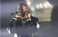  ?? THE NEW YORK TIMES ?? Kendrick Lamar’s new album Damn. was recently certified double platinum. The rapper has also received eight MTV VMA nomination­s for the powerful video for “Humble.”