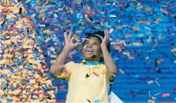  ?? JOHN RAOUX/AP ?? Zaila Avant-garde, 14, from Harvey, Louisiana, is showered with confetti after winning the 2021 Scripps National Spelling Bee on Thursday at Disney World in Lake Buena Vista, Florida.