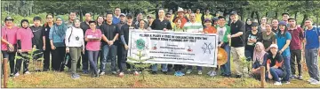  ??  ?? Officials and participan­ts in ‘Pledge And Plant A Tree Programme’.