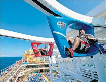  ?? PHOTOS BY CARNIVAL CRUISE LINE/COURTESY ?? One of the most popular attraction­s on the ship is the SkyRide, on which cruisers can “pedal hanging recumbent-like cycles at speeds of up to 18 miles an hour across an elevated 800-foot-long track,” the cruise line said.