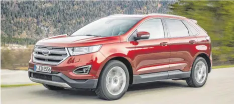  ?? als der beliebte Kuga. FOTO: FORD ?? Mit dem Edge hat Ford einen bulligen SUV im Angebot, der eine Nummer größer ist