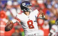  ?? Jeff Haynes / Associated Press ?? New York Giants quarterbac­k Daniel Jones looks to throw a pass against the Tampa Bay Buccaneers during Sunday’s game in Tampa, Fla.