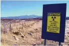  ?? SUSAN MONTOYA BRYAN/ASSOCIATED PRESS ?? In this 2007 photo, a warning sign at the old Kerr-McGee uranium mill site is on open land near Grants.