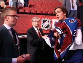  ?? Bruce Bennett / Getty Images North America ?? Ivan Zhigalov is selected by the Colorado Avalanche during Round Seven of the 2022 Upper Deck NHL Draft at Bell Centre on Friday in Montreal, Quebec, Canada.