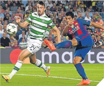  ??  ?? Luis Suarez fires home Barca’s sixth against Celtic in the Nou Camp.