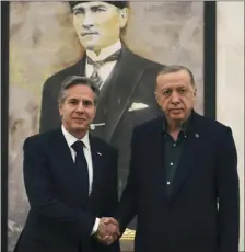  ?? BURHAN OZBILICI — THE ASSOCIATED PRESS ?? U.S. Secretary of State Antony Blinken, left, shakes hands with Turkish President Recep Tayyip Erdogan during their meeting at Esenboga airport in Ankara, Turkey, on Monday.