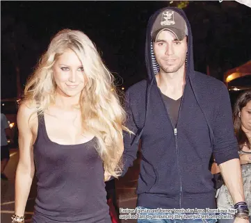  ??  ?? Enrique Iglesias and former tennis star Anna Kournikova have surprised fans by announcing they have just welcomed twins.