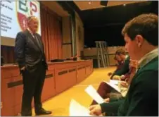  ?? PHOTOS BY KEVIN TUSTIN — DIGITAL FIRST MEDIA ?? Jack Devine speaks with students in the Monsignor Bonner and Archbishop Prendergas­t High School auditorium before addressing the whole school on Thursday morning.