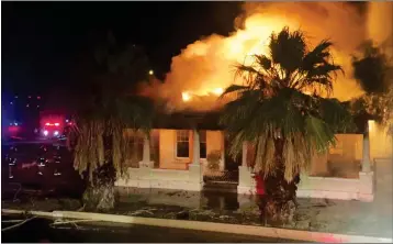  ??  ?? CITY OF YUMA FIREFIGHTE­RS responded to report of a house fire in the 300 block of Main Street shortly before 10 p.m. Tuesday. Once on scene they found heavy smoke and flames coming from a two-story residence. After the fire was extinguish­ed fire crews...