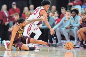  ?? ANDY MANIS, AP ?? Wisconsin guard Chucky Hepburn comes up with one of his five steals against Minnesota on Tuesday night at the Kohl Center.