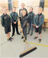  ??  ?? Not amused Young Scouts help clean-up