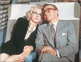  ??  ?? Marilyn Monroe and David Wayne in How To Marry A Millionair­e