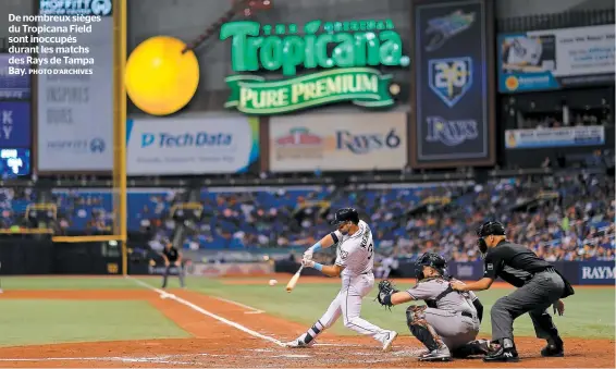  ?? PHOTO D’ARCHIVES ?? De nombreux sièges du Tropicana Field sont inoccupés durant les matchs des Rays de Tampa Bay.