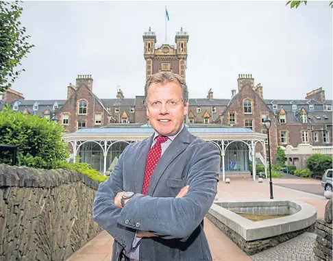  ??  ?? CHALLENGIN­G: Stephen Leckie, chief executive of the Crieff Hydro Family of Hotels. Picture by Steve MacDougall.