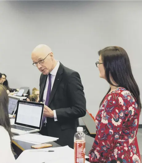  ??  ?? 0 Deputy First Minister John Swinney visits students at Edinburgh Napier University