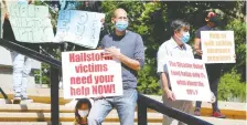  ?? DARREN MAKOWICHUK ?? Led by the Hailstorm Action Committee, a group of residents from northeast Calgary who were affected by the June 13 hailstorm rally outside the Mcdougall Centre on Tuesday.