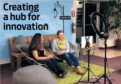  ?? COURTESY PHOTOS ?? Los Alamos marketer Claire Roybal and photograph­er Paulina Gwaltney film a segment of their YouTube channel, Business Over Wine, at projectY co-work space in Los Alamos. An initiative studied what a co-work space might look like in Santa Fe.