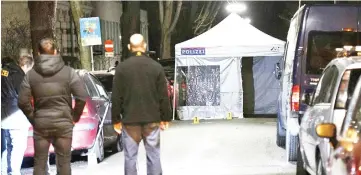  ?? — AFP photo ?? Police officers gather outside the Iranian ambassador’s residence in Vienna.