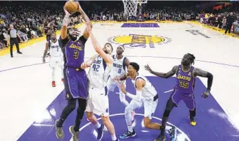  ?? MARCIO JOSE SANCHEZ AP ?? Lakers forward Anthony Davis (3) had 28 points and 20 rebounds but made two big mistakes at game’s end.