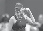  ?? JERRY LAI/USA TODAY SPORTS ?? Maria Sharapova reacts after defeating Simona Halep at the U.S. Open Monday in New York.