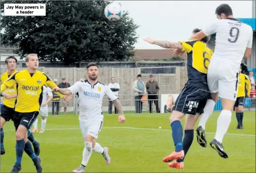  ??  ?? Jay May powers in
a header