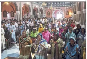  ??  ?? We shall overcome: Pakistani Christians attending a special prayer service for the victims of Sri Lanka’s Easter bombings at Catholic Sacred Heart Cathedral in Lahore, Pakistan. — AP