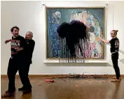  ?? AP ?? Austrian activists of the Last Generation have splashed a Gustav Klimt painting with oil in the Leopold Museum in Vienna. The painting was behind a glass cover and was not damaged.