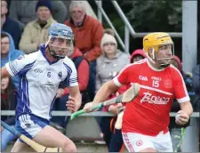  ??  ?? Brian O’Loughlin of Monageer-Boolavogue is pursued by Craanford’s William Conroy in The Courtyard Ferns IHC quarter-final.