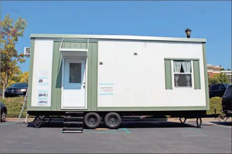  ?? File ?? Tiny houses are a much discussed possible solution to homelessne­ss, a more affordable path to home ownership for young families than traditiona­l houses and as incoming-producing, rental properties.