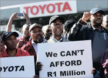  ??  ?? Minibus taxi operators block the entrance to the Toyota manufactur­ing plant during morning rush hours as part of a protest against Toyota in Durban, on May 31. Toyota has responded by announcing a compliment­ary service plan for taxis.