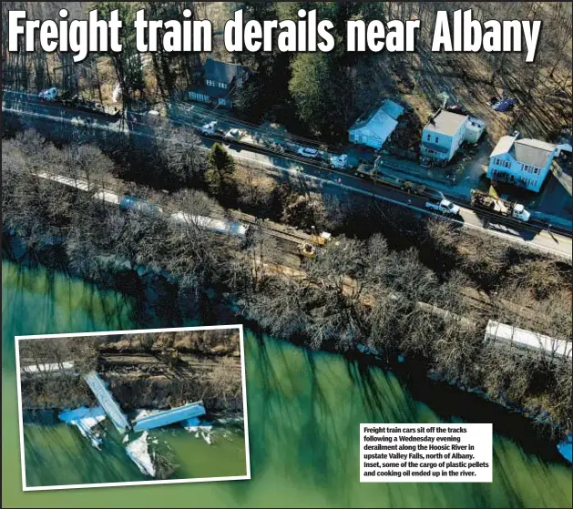  ?? ?? Freight train cars sit off the tracks following a Wednesday evening derailment along the Hoosic River in upstate Valley Falls, north of Albany. Inset, some of the cargo of plastic pellets and cooking oil ended up in the river.