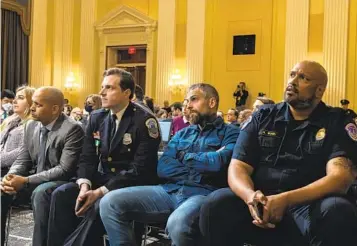  ?? JASON ANDREW NYT ?? From left, U.S. Capitol Police Sgt. Aquilino Gonell, Washington Metropolit­an Police Department Officer Daniel Hodges, former Washington Metropolit­an Police Department Officer Michael Fanone and U.S. Capitol Police Sgt. Harry Dunn attend the Jan. 6 House select committee’s final public hearing Monday.