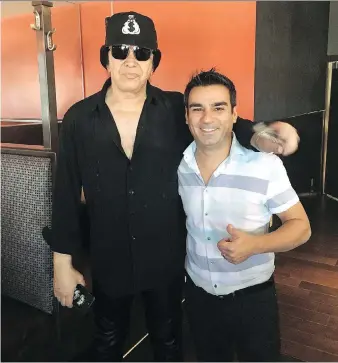  ?? WINDSOR STAR ?? Gene Simmons, left, surprised Jose’s Bar and Grill in Leamington, including the owner Donny Pacheco, right, with an appearance. What the Kiss rocker was up to in Leamington otherwise remains unclear.