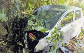 ?? REINER MONTERO ?? El conductor de este Suzuki solo sufrió heridas leves luego de chocar contra una moto cuyo conductor pereció en Guácimo.