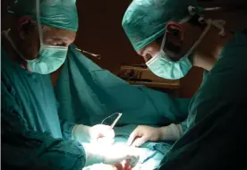  ??  ?? Diego Cervero (right) in an operating theatre with his father, Rafael, in 2009. Photograph: Courtesy of Diego Cervero