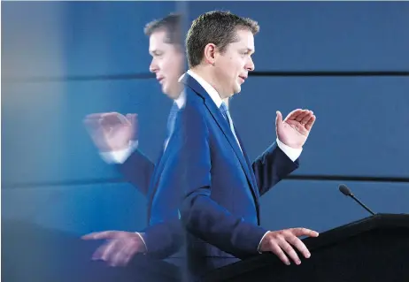  ?? SEAN KILPATRICK / THE CANADIAN PRESS ?? Conservati­ve Party Leader Andrew Scheer’s appointmen­t of former leadership candidate Lisa Raitt to the role of deputy leader is a sign that he is confident in his ability to unite all the confederat­ion of interests within the party, John Ivison writes.