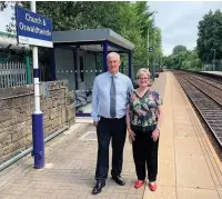  ??  ?? Hyndburn MP Graham Jones at Church and Oswaldtwis­tle Railway Station with disability campaigner, Valerie Martin.