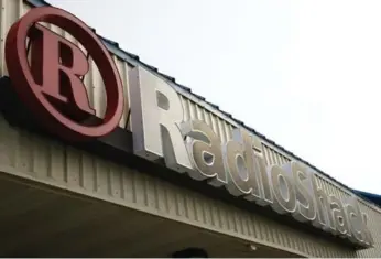  ?? MATT ROURKE/THE ASSOCIATED PRESS ?? RadioShack traces its roots to 1921, when it began as a mail-order retailer for amateur ham-radio operators and maritime communicat­ions officers. The chain has posted more than two years of losses.