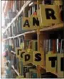  ?? TANIA BARRICKLO — DAILY FREEMAN ?? Thousands of books line the shelves in the office/ warehouse at The Shirt Factory in Kingston, N.Y.