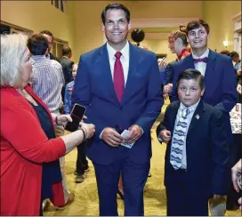  ?? HYOSUB SHIN / HSHIN@AJC.COM ?? Lt. Governor-elect Geoff Duncan arrives with his family Tuesday to Brian Kemp’s election watch party at The Classic Center in Athens. Fewer Georgians voted for the state’s second-highest elected office than any other statewide race.