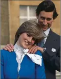  ??  ?? AWKWARD: Charles and Diana announce their engagement