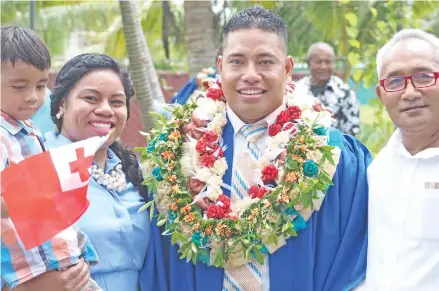  ??  ?? From left: Kaimana Tilini (son), Fatafehi Talini (wife), Ofa-Ki-Okalani Tilini, and proud dad, Solomone Tilini at the Fiji National University Graduation yesterday at the Vodafone Arena, Suva.