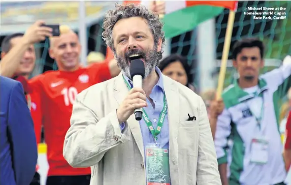  ??  ?? > Michael Sheen at the Homeless World Cup in Bute Park, Cardiff