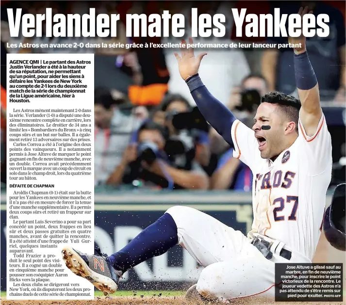  ?? PHOTO AFP ?? Jose Altuve a glissé sauf au marbre, en fin de neuvième manche, pour inscrire le point victorieux de la rencontre. Le joueur vedette des Astros n’a pas attendu de s’être remis sur pied pour exulter.