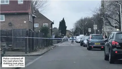  ?? IMAGE: LUCY KING ?? Police cordoned off the road where the stabbing took place