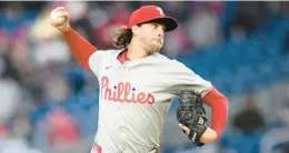  ?? NICK WASS/AP ?? Phillies starter Aaron Nola pitches against the Nationals on April 5 in Washington.